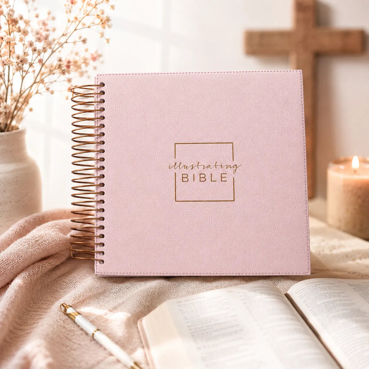 Pink Illustrating Bible on a table